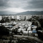 Greece, Patras. A refugee shantytown next to citizens' housing in the port of Patras. Patras is home to about 3,000 illegal immigrants.