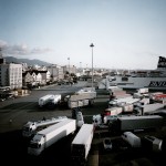 Greece, Patras. Trucks parked on the quay are checked for hiding refugees before they go on board the ship.
