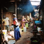 A narrow space behind the central market which is used to prepare food sold from stalls inside the market